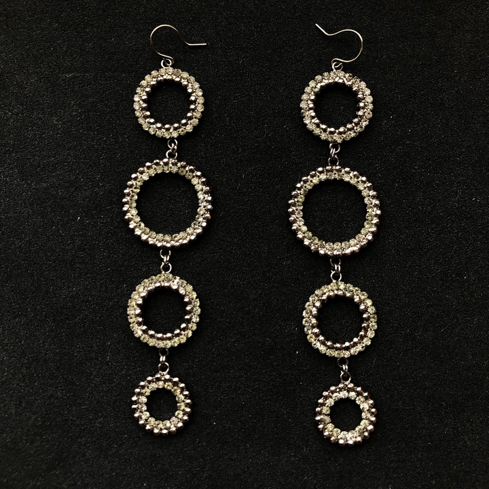 Guess brand earrings, good condition 4” drop